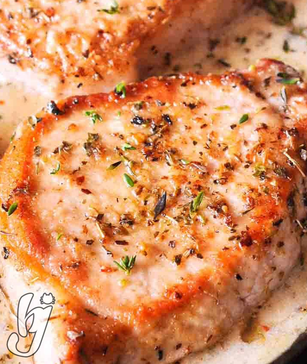Pork Chops in Creamy Garlic and Herb Wine Sauce